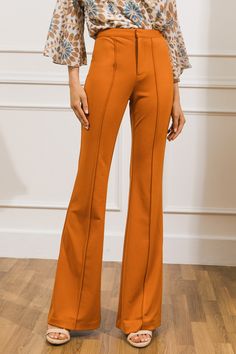 Our BUT BETTER FLARE PANTS offer a flattering fit with a classic center seam. The high rise silhouette creates a streamlined look, while faux back pockets add subtle flair. Enjoy a sleek, sophisticated style while staying comfortable and confident. Details Self: 97% polyester, 3% spandex Imported Size & Fit - Model is 5`8" and wearing size Small - Measurements taken from size Small - Length: 45" Pockets Details, Flying Tomato, Skirt Jumpsuit, Swim Accessories, Stretch Pants, Swimsuit Cover, Sweatshirt Dress, Sophisticated Style