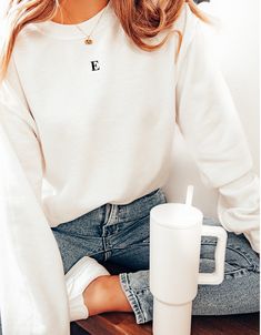 ❀ All letters available. Light blue shirt → white embroidery Black shirt →white embroidery  White shirt → black embroidery  This elegant minimalistic embroidered crewneck sweatshirt is the perfect bridesmaid gift, Christmas gift or birthday gift for your best friend, girlfriend or boyfriend, daughter or mom for mothers day! ❀ High-quality embroidered design on a long sleeve crewneck sweatshirt. ❀ Unisex sizing - see size guide for measurements. Have any questions? Feel free to message us!   *Dis Affordable Black T-shirt With Letter Embroidery, Embroidery Initials Letters On Clothes, Everyday White Tops With Letter Embroidery, White Sweatshirt With Letter Embroidery, White Sweatshirt With Letter Embroidery For Everyday, White Everyday Sweatshirt With Letter Embroidery, White Monogram Cotton Sweatshirt, Matching Sweatshirts For Best Friends, White Crewneck Outfit