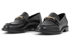 PRICES MAY VARY. Amina are classic penny loafers with a stylish look. The model is in black leather with a round toe, penny strap over the foot and decorative moc-toe details. The low lug measures 30 mm. Vagabond Shoemakers, Flat Shoes Black, Women's Flat Shoes, Leather Loafers Women, Office Shoes, Black Loafers, Penny Loafers, Flat Shoes, Loafers For Women