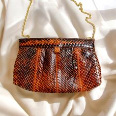 Snakeskin Leather Handbag | Vintage Purse | Brown Leather Bag; no maker's marks 10 x 6 1/4 inches 28 inch long chain (14 inch drop) - it can be tucked inside the purse if you prefer to use it as a clutch there is a tiny nick along the top edge (see last photo), otherwise, in excellent condition **Save 30% if you purchase 3 or more listings. Just enter coupon code OLIVETREE30 at checkout.** Handbag Vintage, Brown Leather Bag, Vintage Purse, Vintage Handbags, Long Chain, Leather Handbag, Snake Skin, Coupon Code, Purses And Handbags