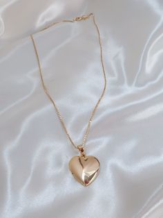 The most perfect heart locket and yes you can add a cute picture in there! Details Length: 18in Pendant: 29.4 x 19.3 mm Materials 18k gold filled Hypoallergenic Lead and nickel free Care For the best care of your product, remove before showering. Avoid excessive use of lotions and sanitizers, best to apply before adding your jewelry. Wipe down your jewelry with a soft, lint-free polishing cloth (we provide one) and stored in a safe dry place. Perfect Heart, Heart Locket Necklace, Cute Picture, Heart Locket, Gift Card Sale, Christmas Wishlist, Locket Necklace, Chain Pendants, Earring Necklace