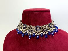 High quality royal blue and white Indian choker set with matching earrings. ------------------------------------------------------------------------------ ♡ SPECIAL PRICING ♡   Buy 2 or more items and get free delivery anywhere in Canada. Free US delivery for orders over $35 USD ♡ WEBSITE ♡  Shop directly on our website for more deals  www.TheJewelBlitz.com  ------------------------------------------------------------------------------ ♡ SHIPPING ♡   All of our orders come with tracking and are Blue Necklace Set, Royal Blue Necklace, Indian Choker, Jewelry Royal, Jewelry Kundan, White Choker, Kundan Jewelry, Choker Set, Kundan Jewellery