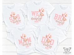 *Please Note*: The word "bearly" is spelled incorrect on purpose to match the bear design. Looking for unique Baby Shower ideas? Well, matching family baby shower shirts are the perfect way to celebrate your exciting baby shower. These shirts will be a hit at your baby shower and we can customize to fit your needs.   Get Matching Printable Decorations Here:  https://www.etsy.com/listing/1471486911/bundle-we-can-bearly-wait-baby-shower?click_key=5db6ed2be2d3c4b40c479c0f9351ec7fa4143a78%3A14714869 Baby Shower Shirts For Family Design, Cute White T-shirt With Bear Design, White Bear Design Short Sleeve Tops, White Short Sleeve Top With Bear Design, Unique Baby Shower Ideas, Baby Shower Shirt, Baby Shower Oso, Bear With Balloons, Baby Shower Shirts