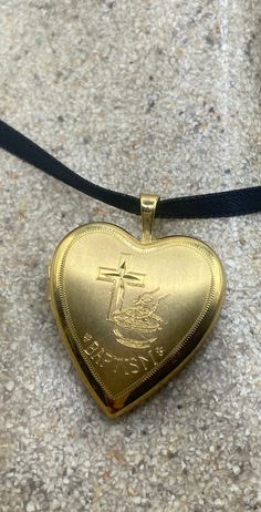 Vintage Locket Choker Gold Filled Heart Baptism Necklace https://www.etsy.com/listing/1464628876/vintage-locket-choker-gold-filled-heart Personalized Adjustable Gold Locket Necklace, Gold Adjustable Locket Necklace For Keepsake, Gold Engraved Jewelry For Baptism, Vintage Gold Locket, Cross Choker Necklace, Vintage Locket, Cross Choker, Boho Trends, Choker Gold