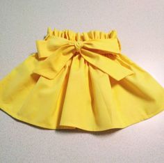 Cute Solid Color Summer Skirt, Cute Ruffled Skort For Party, Cute Party Skort With Ruffles, Cute Skirt For Spring, Flared Skirt With Bow Detail, Party Cotton Mini Skirt With Ruffles, Cotton Mini Skirt With Ruffles For Party, Cute Ruffled Mini Skirt, Cute Ruffled Skirt