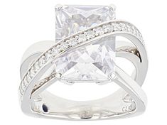 Vanna K™ For Bella Luce® white diamond simulant 11.40ctw rectangle and round, Platineve® 11th Anniversary ring. Measures approximately 0.88"L x 0.56"W and is not sizeable. The diamond equivalent weight is 6.90ctw. Each Vanna K™ design has a signature label that features a lab created sapphire. Luxury White Rectangular Ring, White Cubic Zirconia Square Cut Ring, Elegant Diamond Ring With Brilliant Rectangular Cut, Elegant Diamond Ring With Rectangular Brilliant Cut, Elegant Rectangular Brilliant Cut Diamond Ring, Formal White Rectangular Ring, White Square Cut Diamond Ring With Vs Clarity, White Rectangular Diamond Ring With Vs Clarity, White Rectangular Rings With Center Stone