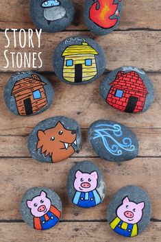 some rocks with different pictures on them and the words story stones written in front of them