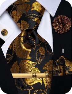 PRICES MAY VARY. 【Tie Set】 Black Gold Floral Tie+ Pocket Square+ Cufflink*2+ Tie Clip+ Lapel Pin 【Tie Size】Necktie: 3.1 '' × 59 '' (8cm × 150cm); Handkerchief : 9.4'' x 9.4 '' (31cm x 31cm); Tie Clips (2.3'' x 0.23''); Cufflink: 0.55''; Men's necktie can be paired with suit/shirt/vest suit/performance dress 【Material】 Mens tie, pocket square and lapel pin are made of silk, high-quality silk fabric soft and comfortable. 2400 stitches jacquard woven craft, high-density fabric makes the tie non-def Silk Patterned Ties For Black Tie Events, Luxury Gold Ties For Wedding, Luxury Silk Ties For Semi-formal Occasions, Elegant Patterned Ties With Paisley Print, Luxury Patterned Ties For Semi-formal Occasions, Floral Necktie, Performance Dresses, Cufflink Set, Tie Set