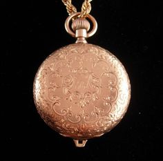 This victorian Elgin pocketwatch has and etched mourning bird on one side and a shield on the other with the initials B.S. The case is really beautiful and well made with no dents or dings. This has a front and back lid to protect the watch and is made by the Elgin Watch Co. It hangs from a thick gold plated chain and it runs well. The second hand fell off but it still works great. 9-8-18 Luxury Antique Engraved Pocket Watch, Antique Engraved Jewelry And Watches For Wedding, Formal Heirloom Medallion Locket Necklace, Engraved Antique Gold Pocket Watch For Formal Occasions, Heirloom Engraved Pocket Watch For Wedding, Formal Rose Gold Engraved Locket Necklace, Victorian Pocket Watch For Anniversary, Antique Engraved Jewelry And Watches As Gifts, Antique Engraved Jewelry And Watches For Gifts