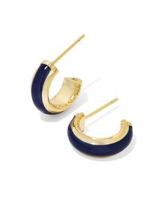 Amp up your earring game with the Ainsley Gold Huggie Earrings in Navy Enamel. The minimal huggie style goes bold with hand-painted enamel embellishments, and the sides feature our signature hoofprint detailing for added texture. Lightweight enough for all-day wear, this pair will take any look from everyday to occasion ready. Metal 14k Yellow Gold Over Brass Material Navy Enamel Closure Ear Post Size 0.59"L X 0.56"W StationDue to the one-of-a-kind nature of the medium, exact colors and patterns Navy Blue Jewelry, Hoof Print, Gold Huggie Earrings, Surf Jewelry, Huggie Earrings Gold, Colorful Earrings, Blue Jewelry, Huggie Earrings