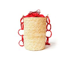 A traditional raffia bucket, simple but more than basic.This style can be worn from day to night, from beach to city, en route to the sand or a seaside dinner.Enjoy it!  21cm bucket’s high · 17 cm width · 40 cm belt  Materials: Raffia, Silk/Satin, Calf leather -- PRODUCT CARE  This item’s accessories are enterely hand Chic Open Weave Bucket Shoulder Bag, Chic Handwoven Straw Bucket Bag, Bucket Straw Bag With Bamboo Handle, Chic Woven Bucket Beach Bag, Spring Woven Bucket Bag, Natural Fiber Bucket Shoulder Bag With Open Weave, Natural Fiber Open Weave Bucket Shoulder Bag, Chic Straw Bucket Bag, Natural Handwoven Bucket Bag For Beach Season