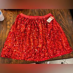 Red Sequin Skirt 14/16 Xl New Red Festive Skirt For Spring, Red Festive Holiday Skirt, Red Holiday Festive Skirt, Red Skirt For Winter Holiday, Red Winter Holiday Skirt, Festive Red Holiday Skirt, Red Christmas Skirt For Festive Occasions, Red Skirt For Christmas Holiday, Festive Red Skirt For Christmas