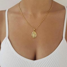 DESCRIPTION: Beautiful high polish 18K Gold Plated Mary necklace that is the perfect piece for any outfit! LENGTH: Multiple chain sizes available for selection above. Pendant size: 1 inch. MATERIAL: 18K Gold Plated over Stainless Steel. Hypoallergenic, Tarnish Free and Water Resistant. Mix and match with any of our 18K Gold Necklaces and Anklets to create the most unique and customized look! All orders are shipped out within 1 business day. PoshForKeeps is proud to be a USA company. Heart Initial Necklace, Customized Necklace, Mary Necklace, Gift For Him Birthday, Heart Necklaces, 18k Gold Necklace, Love Pendant, Necklace Heart, Gold Heart Necklace