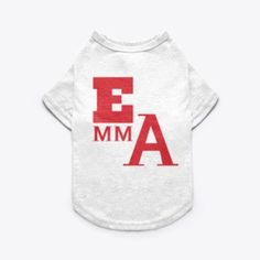 a white dog shirt with the letter e in red on it's chest and back