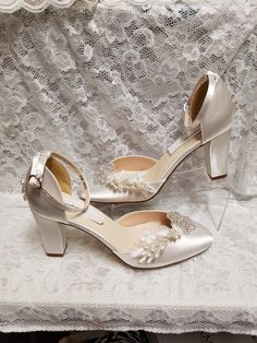 "Bling Wedding shoes closed toes, square heels, ankle straps. Featuring a beautiful crystals flowers, vintage lace appliqués, and vintage asares. I only have materials for 14 pairs. Heel: 2.5\" Colors: White, Off-white, and Ivory. US Sizes: 5, 5.5, 6, 6.5, 7, 7.5, 8, 8.5, 9, 9.5, 10. M width. Outside USA, please goggle a shoe size chart converter, or contact for help! Style: Vintage 20's -40's Great Gatsby, Flapper shoes! Please look at all the pictures TO BUY COLOR SWATCH SAMPLES: to view color Vintage White Heels For Wedding, Elegant Closed Toe Heels For Vintage Events, Vintage Wedding Heels With Pointed Toe, Vintage Heels With Pointed Toe For Wedding, Vintage Pointed Toe Heels For Wedding, Vintage Wedding Heels With Round Toe, Fitted Wedding Shoes With Heel Strap And Closed Toe, Vintage Round Toe Heels For Wedding, Fitted Closed Toe Wedding Shoes With Heel Strap