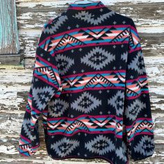 Aztec Fleece Jacket for Women – Western Zip-Up Sweatshirt, Black Aztec Boho My go-to fleece sweatshirt this Fall! This stylish Western Aztec Fleece Jacket features a vibrant Aztec print in black, grey, hot pink, orange, and turquoise for a boho-chic flair. With a convenient zip-up design, this jacket is perfect for Fall weather—warm, cozy, and lightweight! ✅ Eye-Catching Design: Bold Aztec print adds a fun and fashionable touch.✅ Convenient Zip-Up: Easy to wear and take off, perfect for on-the-g Multicolor Fleece Sweatshirt With Long Sleeves, Multicolor Fleece Long Sleeve Sweatshirt, Multicolor Long Sleeve Fleece Sweatshirt, Fleece Long Sleeve Top For Outdoor, Long Sleeve Fleece Top For Outdoor, Multicolor Fleece Winter Tops, Multicolor Fleece Tops For Winter, Casual Multicolor Fleece Jacket With Fleece Lining, Multicolor Long Sleeve Fleece Jacket With Pockets