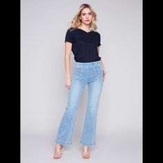 Shake Things Up In These Flared Twill Jeans For Women. The Stretchy Jeans Come With Decorative Button Plackets At The Waistband In The Front, A Regular-Rise Waist, And A Flattering Flared Leg To Let You Enjoy Spring And Summer In Style And Comfort. Get Them In Two Shades. Look No Further Than These Light Blue Jeans For Women. Mid-Rise Waist Decorative Buttons At Front Waistband Stretch Denim Flare Leg Design Pull-On Style 2 Back Pockets Trendy Summer Flare Jeans With Button Closure, Summer Mid-rise Flare Jeans With Button Closure, Mid-rise Flare Jeans With Button Closure For Summer, Summer Denim Blue Flare Jeans With Button Closure, Chic Spring Flare Jeans With Buttons, Spring Medium Wash Flare Jeans With Button Closure, Dark Wash Summer Flare Jeans With Button Closure, Trendy Denim Blue Flare Jeans With Buttons, Summer Dark Wash Flare Jeans With Button Closure