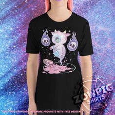 Kawaii Pastel Goth Aesthetic Creepy Cute Strawberry Milk Ghost Cow Flaming Skulls Shirt, Pastel Goth Halloween T-Shirt, Kawaii Pastel Goth Tshirt. Cute and creepy pagan occult gothic design. Cute and creepy vaporwave harajuku aesthetic gothic pagan occult design. Pastel goth kawaii - creepy  kawaii pastel goth aesthetic design. Cute spooky kawaii design for men & women who loves Nu Goth, bubble goth, cute goth, menhera vaporwave aesthetic outfit, cute pastel goth aesthetic or lofi Harajuku style anime inspired / strawberry milk aesthetic Halloween costume idea. Please visit https://www.zowpigshirts.com/post/mooooooooo-i-mean-boo for the story of this design! A creepy cute & kawaii tongue-in-cheek take on the Pastel Goth Aesthetic / Harajuku Style Anime Strawberry Milk Japanese milk carton Harajuku Style Halloween Graphic Print Tops, Emo Anime Print Tops For Halloween, Black Kawaii T-shirt With Funny Print, Harajuku Style Halloween Short Sleeve Tops, Harajuku Tops For Halloween, Pastel Goth Graphic Print Crew Neck Top, Harajuku Style Top For Halloween, Emo Anime Print T-shirt For Halloween, Harajuku Anime Print Halloween Top