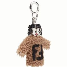 Authentic Fendi Ff Bag Charm From Fendi's Capsule Collection. This Whimsical Bag Charm Has A Shearling Puff Body With Metal Detailed Face, Leather Eyebrows, And A Palladium-Finish Spring Clip. Black And Brown, Fendi, Women Accessories, Leather, Women Shopping, Black