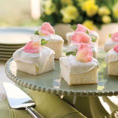 small desserts are sitting on a cake plate