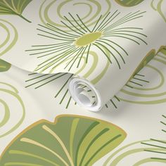 a green and yellow wallpaper with leaves on it's sides, in an abstract pattern