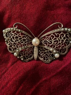 Lovely vintage silver butterfly brooch in perfect condition Large natural pearl in the centre  38 smaller pearls on wings Magnificent piece Elegant Silver Butterfly Brooches, Elegant Silver Butterfly Brooch, Vintage Butterfly Brooch For Formal Occasions, Silver Butterfly Brooch For Wedding, Pearl Butterfly, Butterfly Brooch, Silver Butterfly, Natural Pearl, Natural Pearls