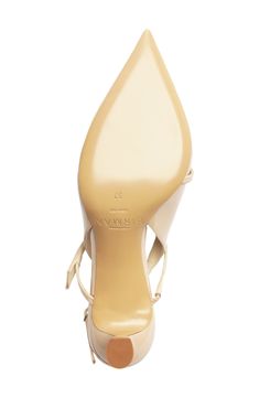 Twin straps crossing the open vamp of this pointy-toe slingback add a modern touch of elegance. A low, sculptural bell heel combines comfort, style and practicality for an effortless day-to-night look. 2 1/4" (60mm) heel Adjustable slingback strap with buckle closure Leather upper, lining and sole Made in Italy Designer Shoes Designer Slingback Pumps With 4-inch Heel And Pointed Toe, Luxury Slingback Pumps With Single Toe Strap, Designer Slingback Pumps With Removable Insole And Open Heel, Designer Slingback Heels With Sculpted Heel, Luxury Formal Slingback Sandals With Wrapped Heel, Luxury Slingback Kitten Heels With Sculpted Heel, Designer High Heel Slingback Pumps With Removable Insole, Slingback Pumps With Single Toe Strap For Evening, Luxury Slingback Sandals With Sculpted Heel