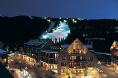 an aerial view of a ski resort at night