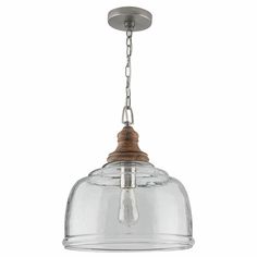 a clear glass light fixture hanging from a metal ceiling fixture with a wooden handle and chain