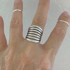 *  Perfect gift idea for any occasion: birthday, anniversary, engagement, graduation, bridesmaid, Mother's Day, Valentine's Day, Christmas, promise. *  Gorgeous Wide band Sterling Silver Ring, Statement Ring, Silver Ring, Wedding Silver Ring, Large Ring, Wide Ring, Boho Ring, Love Ring, Promise Ring, Wide Band, Wide Ring, Unique Ring, Index Ring, Thumb, 925 Stamped Face Height: 16 mm Metal Material: Sterling Silver Finish: High Polish *  Your purchase includes a gift box come. Let us know if thi Modern Adjustable Stackable Rings For Anniversary, Adjustable Gold Midi Rings For Anniversary, Adjustable Modern Midi Rings For Anniversary, Silver Open Ring Midi Rings For Anniversary, Modern Adjustable Wide Band Ring For Wedding, Adjustable Open Band Rings For Anniversary, Hypoallergenic Silver Wedding Ring, Adjustable Hypoallergenic Ring For Wedding, Silver Stackable Wide Band Ring For Anniversary