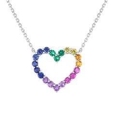 Beautiful in meaning and appearance, celebrate the colorful wonder of rainbows with this sterling silver necklace. This stunning necklace boasts a heart shaped stationary pendant that is lined with round gemstones in a rainbow of vibrant hues. The gemstones include created blue, yellow, and orange sapphire, amethyst, created ruby, and created emerald. This heart pendant measures 16mm in both length and width and is set on a cable chain that can be worn at 16 or 18 inches in length. Multicolor Heart Cut Jewelry For Valentine's Day, Rainbow Multi-stone Necklace In Fine Jewelry Style, Multicolor Heart Pendant Jewelry For Mother's Day, Multicolor Heart Charm Jewelry For Mother's Day, Sterling Silver Gemstone Heart Necklace, Elegant Multicolor Heart Cut Jewelry, Valentine's Day Multicolor Pendant Jewelry, Multicolor Gemstone Jewelry For Valentine's Day, Multicolor Heart Charm Jewelry For Anniversary