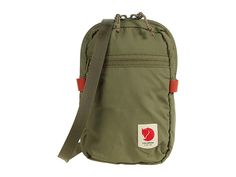 Fjallraven High Coast Pocket - Bags : Green : The Fjällräven High Coast Pocket is a high-utility pack featuring a water-resistant shell and adjustable, detachable shoulder strap for carrying convenience. 100% recycled nylon main fabric and lining. Adjustable top zip closure. Waterproof outer shell. Imported. Measurements: Bottom Width: 4 1 2 in Middle Width: 5 1 2 in Top Width: 4 1 2 in Depth: 1 1 2 in Height: 6 1 2 in Strap Length: 57 in Strap Drop: 29 in Weight: 3 oz Bass Fishing Tips, Herschel Heritage Backpack, Pocket Bag, Green Bag, Bags Handbags, Water Resistant, Shoulder Strap, Handbags