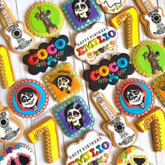 decorated cookies are arranged in the shape of letters and numbers for day of the dead