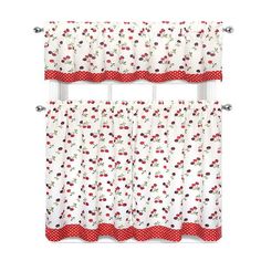 two red and white curtains with cherries on them