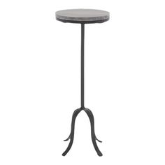 a black metal table with an iron base and round top, on a white background