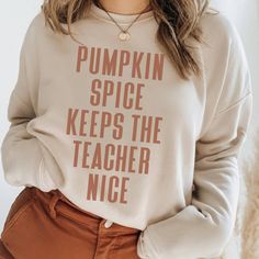 Cute Fall Shirts for teachers, Teacher Costume, Aesthetic Autumn Apparel, Halloween Teacher Sweatshirt, Teacher Appreciation Gift, Cool Weather Tshirts for Moms and Fall Tees get 20% OFF NOW! Login for Extra Discounts! The Perfect Shirt for Fall! Get $5 OFF NOW! bit.ly/x3sass5offnow Love the design, but want to browse other beautifully soft tees for your wardrobe? We are constantly adding new designs! Follow me... www.x3sass.etsy.com These t-shirts are likely to become your new favorite! Super s Cute Fall Teacher Shirts, Teacher Fall Shirts, Teacher Thanksgiving Shirts, Cute Text Print Sweatshirt For Fall, Funny Long Sleeve T-shirt For Fall, Funny Text Print Tops For Fall, White Sweatshirt For Teacher Appreciation In Fall, Pre-shrunk Funny Tops For Fall, White Tops With Funny Text For Fall