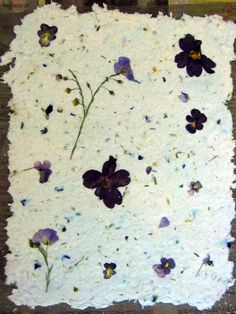 a piece of paper that has flowers on it