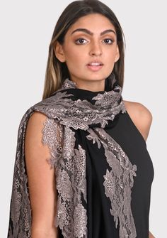 This black scarf is an all time classic with a little bling. Woven from a fine silk and wool blend, it features a contrasting Antique Silver floral lace border making for the perfect any time wear accessory whilst keeping you comfortably warm. For a casual or formal look, this is a must-have in every woman's wardrobe. Black Scarf, Lace Border, Formal Looks, Women's Wardrobe, Wool Scarf, Black Silk, Every Woman, All Time, Floral Lace