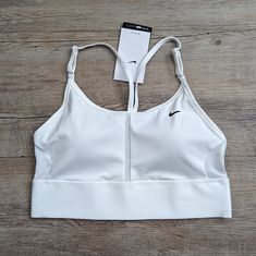 New In Plastic. Nike Bras, Sport Fits, Tennis Outfits, Front Zip Sports Bra, Nike Pro Women, Sports Bra Top, Medium Support Sports Bra, Hunting Trip, Padded Sports Bra