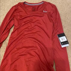 Brand New Nike Tee Red Athleisure Top For Fall, Nike Casual Top In University Red, Nike Workout Tops For Fall, Red Long Sleeve Athleisure Top, University Red Long Sleeve Sporty Tops, Nike Sporty Tops In University Red, Nike Sporty University Red Tops, Nike Red Sporty Tops, Nike Sporty Red Top