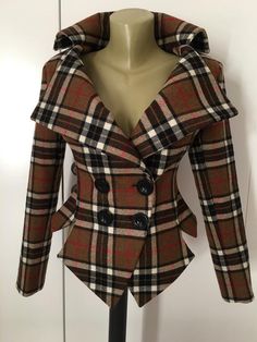 This is a very stylish and elegant wool plaid jacket . Leght  58 cm - at back. made of very soft and high quality woolen fabric. The jacket is fully lined. SIZE CHARTSIZE S  - US  6, UK 8, EU 36bust:  bust around 34.5”/90cmWaist:  waist around 27.5”/70cmHips: hips around 34.5”/90cmSIZE M  -  US 8, UK 10, EU 38bust: bust around 37.5”/95cmWaist:  waist around 29.5”/75cmHips:  hips around 37.5”/95cmSIZE L - US 10, UK 12, EU 40bust:  bust around 39.5"/100cmWaist:  waist around 31.5”/80cmHips:  hips Fitted Tweed Wool Coat With Long Sleeves, Elegant Plaid Wool Outerwear, Plaid Wool Coat With Long Sleeves, Fitted Double-breasted Houndstooth Outerwear, Winter Plaid Wool Tweed Jacket, Fitted Plaid Tweed Wool Jacket, Tailored Plaid Wool Outerwear, Plaid Wool Tweed Jacket For Tailoring, Single Breasted Plaid Tweed Outerwear