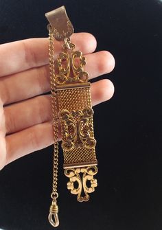 -Antique Victorian Gold Filled Wide Pocket Watch Chain Fob Decor -Fob size: 4.25 in x 0.75 in -Chain length: 4.75 in -Total weight: 16.1 g -Marked PAT6-908JMEF&C -Tested gold filled Vintage Rectangular Chain Jewelry, Antique Gold Pocket Watch, Jewelry History, Antique Pocket Watch, Men's Brooch, Vintage Jewelry Antique, Pocket Watch Antique, Chandbali Earrings, Pocket Watch Chain