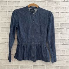 Lucky Brand Dark Wash Chambray Shirt True Indigo Collection Size 2 Snap Front And Cuffs Peplum Styling Lightweight Euc If Not Nwot. I See No Signs Of Wear On This Item, And It Feels New To Me. Measured Flat: Pit To Pit: 16" Sleeve: 21" From Back Collar Down To Bottom: 22.5" Great Top By Lucky Brand! Perfect To Dress Up Or Down And Just So Many Ways To Style This Top! Remember To Visit My Closet, Do Some Shopping And Bundle! If You Create A Bundle, I Will Send You An Offer With My Best Possible B Spring Denim Blue Blouse With Pockets, Denim Blue Cotton Blouse With Pockets, Collared Chambray Top In Dark Wash, Summer Dark Wash Button-up Blouse, Dark Wash Chambray Collared Top, Dark Wash Relaxed Fit Cotton Blouse, Fitted Denim Blue Collared Top, Fitted Collared Denim Top, Fitted Dark Wash Top For Work