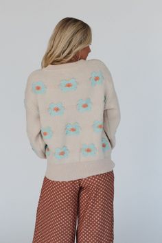 So boho and unique, you're going to love the Rainy Bloom Sweater! This sweater is perfect to throw over any of your favorite boho outfits and feel cozy and cute! So cozy thick fabric with so pretty daisy floral pattern throughout Oversized pullover silhouette Classic round neck, dropped shoulders, and loose long sleeves Ribbed trim along the neckline, cuffs and bottom edges Pair with: Floral Textured Padded Bralette, Offshore Patchwork Detail Pants and Seeing Stars Bracelet Set. *Due to lighting Stars Bracelet, Boho Essentials, Bralette Outfit, Padded Bralette, Throw Over, Loose Long Sleeve, Comfy Pants, Oversized Pullover, Thick Fabric