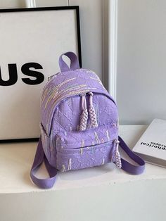 This Stylish Striped Nylon Backpack is the perfect accessory for shopping, travel, and casual outings. It's made from durable nylon and features a trendy striped design, making it both fashionable and functional. Stay organized with its multiple compartments and travel with ease thanks to its lightweight construction. Features : Lightweight, Foldable, High-capacity, Multi-function Color : Purple Pattern Type : Letter, Plaid, Plants Material : Polyamide Type : Classic Backpack Style : Casual, Cute, Preppy, Sporty, Vacation, Funky Closure Type : Zipper Bag Size : Mini Composition : 100% Polyamide Summer Backpack With Zipper Closure For Students, Summer Student Backpack With Zipper Closure, Purple Nylon Student Backpack, Student Summer Backpack With Zipper Closure, Purple Nylon Backpack For Back To School, Back To School Purple Nylon Backpack, Casual Purple Nylon Backpack, Casual Purple Backpack With Zipper Closure, Spring Nylon Backpack