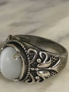 Beautiful Sterling Silver Ring, Vintage Filigree Ring, 925 Silver Chunky ring, Size 9 1/4, Estate Jewelry, Ring for Her What a lovely ring! This ring has white stone that changes shade shade gray depending on the light. I love the designs that it has on the sides. This ring has very good weight and any woman would fall in love with this ring. Perfect to give on any occasion! In great condition! Stone size 17 mm X 14 mm If you purchase more than one item in our shop, we are happy to combine them 70s Silver Jewelry, Antique Jewelry Silver, Chunky Y2k Rings, Chunky Ring With Stone, Cool Chunky Rings, Funky Silver Rings, Silver Chunky Ring, Vintage Filigree Ring, Vintage Jewelry Silver