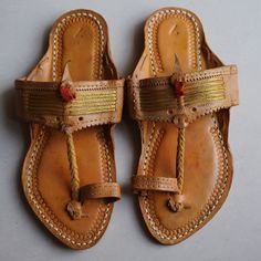 30% OFF on all items and get 10% EXTRA Discount on Purchase THREE or MORE items COUPON CODE-GANPATI . Handmade Jutti closure:- pull on Color:- Tan Material:- Leather Made:- Handmade Sole:- Leather Can Be Personalized:- Yes Transform your footwear collection with the rustic charm of our exquisite Kolhapuri slippers, a fusion of traditional Indian craftsmanship and contemporary style. These handmade, brown leather slides epitomize the essence of authentic Kolhapuri chappals, renowned for their ric Traditional Leather T-strap Sandals With Closed Toe, Traditional Leather T-strap Closed Toe Sandals, Traditional Closed Toe Leather T-strap Sandals, Traditional Slip-on Toe Ring Sandals For Beach, Traditional Sandals With Single Toe Strap For Festive Occasions, Traditional Closed Toe Toe Ring Sandals For Festivals, Traditional Festive Sandals With Single Toe Strap, Traditional Toe Ring Slip-on Sandals For Beach, Traditional Leather Sole Festival Sandals