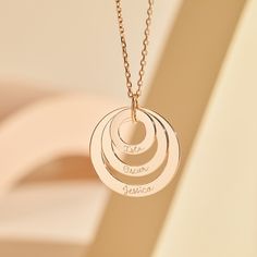 They say three's a crowd, but not with our Personalized Eternity Trio Necklace. Created to symbolize the special moments in your life, add a hand-engraved message to each ring.18K Champagne Gold Plated or 925 Sterling SilverCircles: 1.2”, 0.9” and 0.6” in diameterCharms are removable from this chain and can be worn on all Merci Maman chain lengthsHand-engraved in our Paris workshopSent with love in a complimentary gift boxAny slight variations in lettering depth, spacing and alignment from the e Engraved Circle Necklaces For Anniversary, Round Jewelry With Polished Finish For Mother's Day, Personalized Yellow Gold Circular Jewelry, Rose Gold Round Jewelry With Engraving Option, Rose Gold Laser Engraved Jewelry For Anniversary, Laser Engraved Rose Gold Jewelry For Anniversary, Laser Engraved Round Jewelry For Mother's Day, Promise Jewelry In White Gold With Hallmarks, Personalized Round Jewelry For Promise