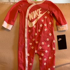 Nike Smoke Free Home Cotton Long Sleeve Onesie For Sleep, Nike Cotton Onesie For Loungewear, Nike Cotton Playtime Sets, Playful Cotton Onesie For Sleep, Cute Cotton Onesie For Sleep, Cute Cotton Sleep Onesie, Nike Loungewear Sets, Nike Long Sleeve Loungewear Sets, Red Long Sleeve Onesie For Playwear