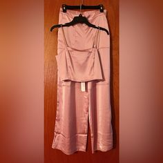 Wt House Of Harlow 1960 Satin Style 2-Piece Spaghetti Strap Crop Top Pant Set With Metal Strap Accent; Wide Leg Pant Features A Cargo Pocket On One Side And 2 Side Pockets And Elastic Waist For Comfort; Color Pink/Rose Petal; Size Small (S); Never Worn; Approx Measurements In Pics (Inches) Elegant Fitted Loungewear Sets, Formal Fitted Silk Pant Set, Formal Silk Fitted Pant Set, Fitted Satin Loungewear Sets, Sleeveless Evening Sets For Spring, Elegant Fitted Two-piece Bottoms Set, Spring Evening Sleeveless Sets, Satin Evening Sets For Spring, Elegant Two-piece Evening Bottoms